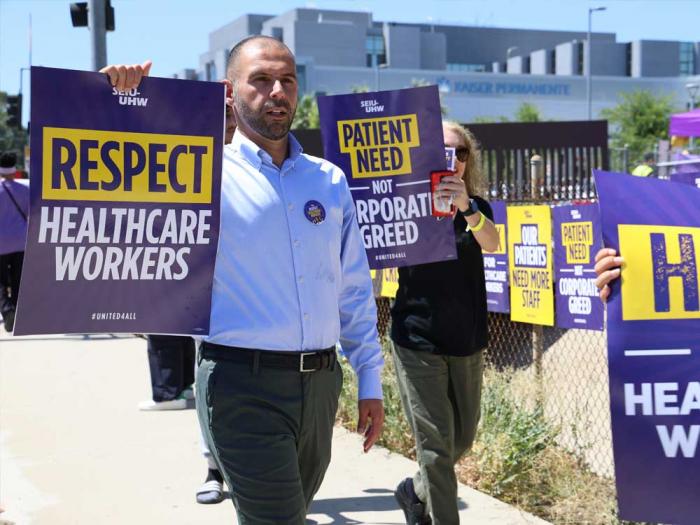 Congressional candidate Jirair Ratevosian, Ph.D., joined health care workers demonstrating for better conditions outside Kaiser Permanente in Los Angeles on July 29. Photo: Courtesy the candidate