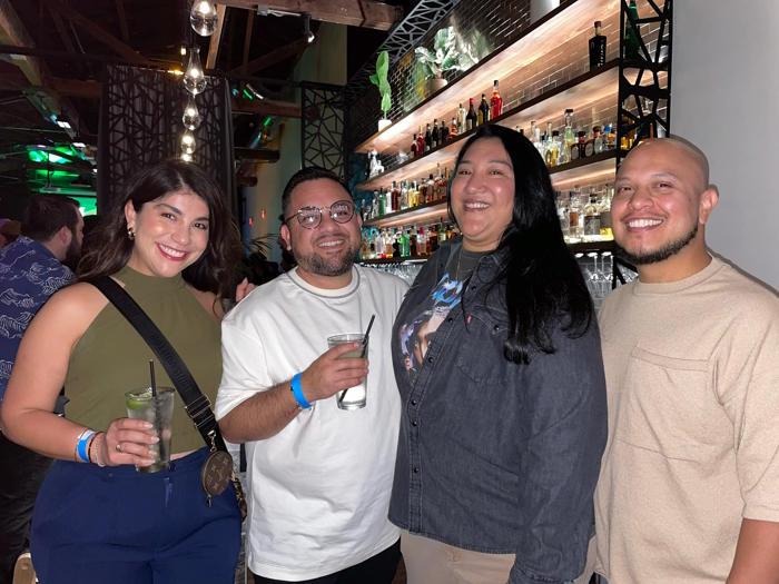 Fluid510 regular Oscar Hernandez, (right) with friends (left to right) Gloria Martinez, Noel Muniz, and Bianca Becerra at the bar and event venue's opening party on May 20. (photo: Heather Cassell)